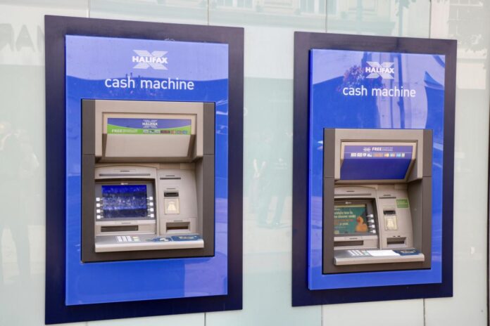 two blue and black Halifax Cash Machines